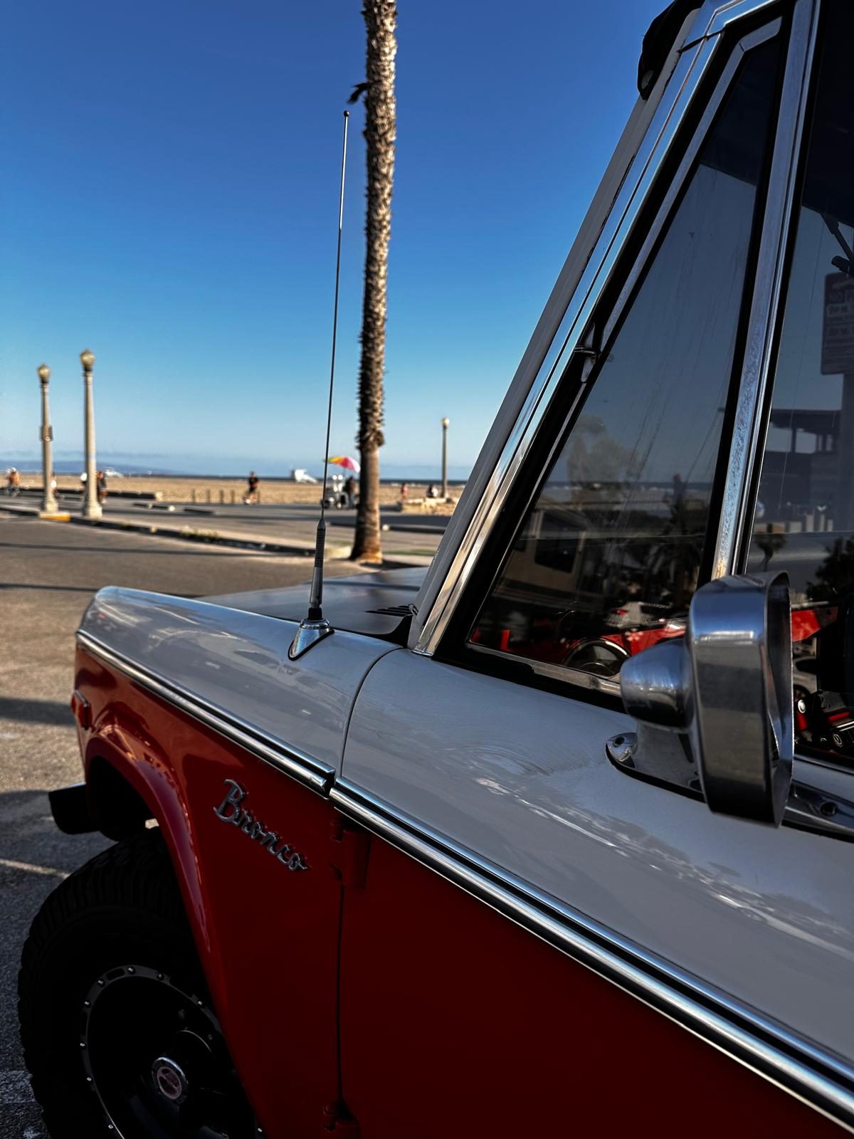 Front quarter and mirror by the beach