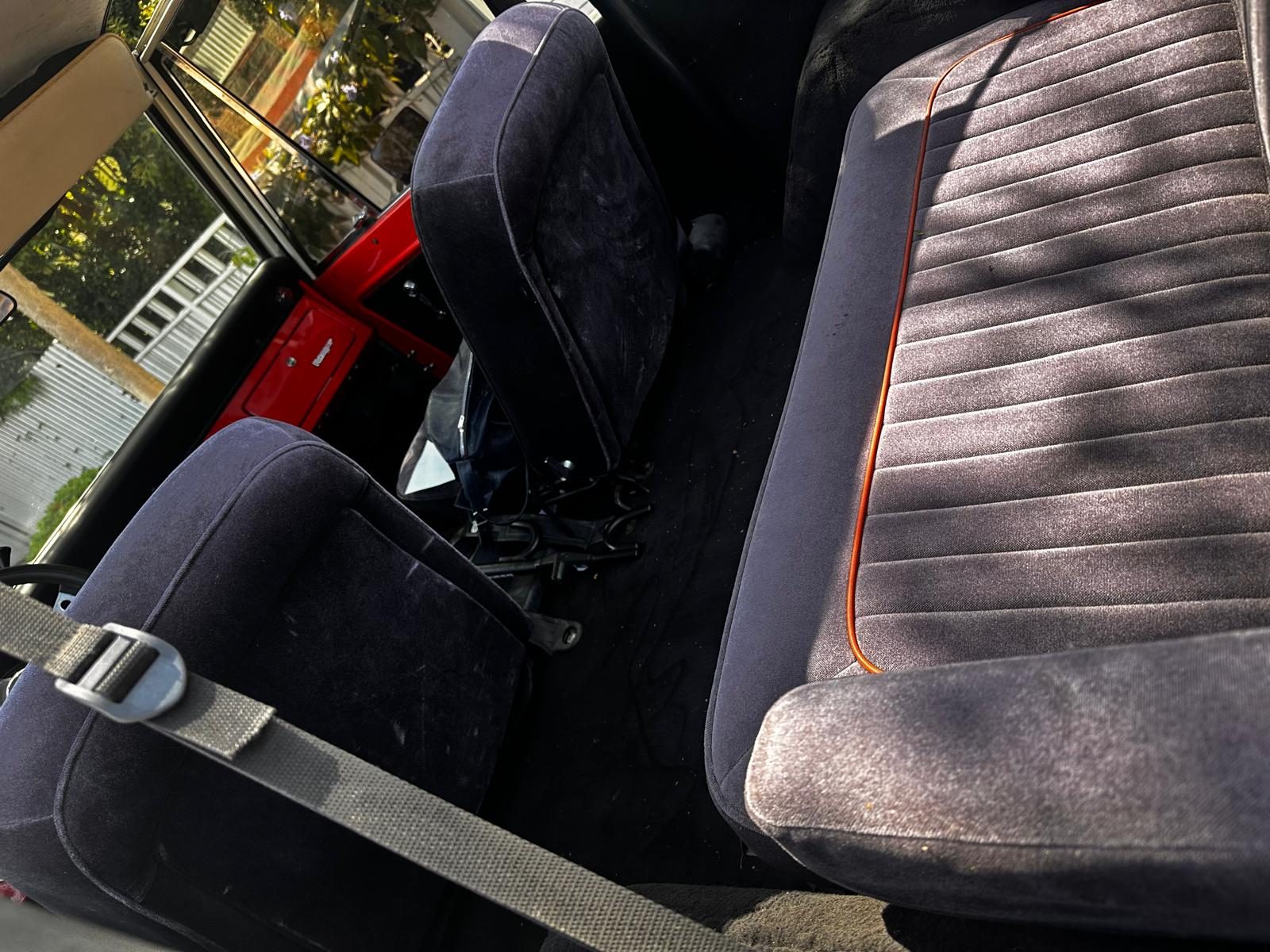 Front and rear seats with orange piping